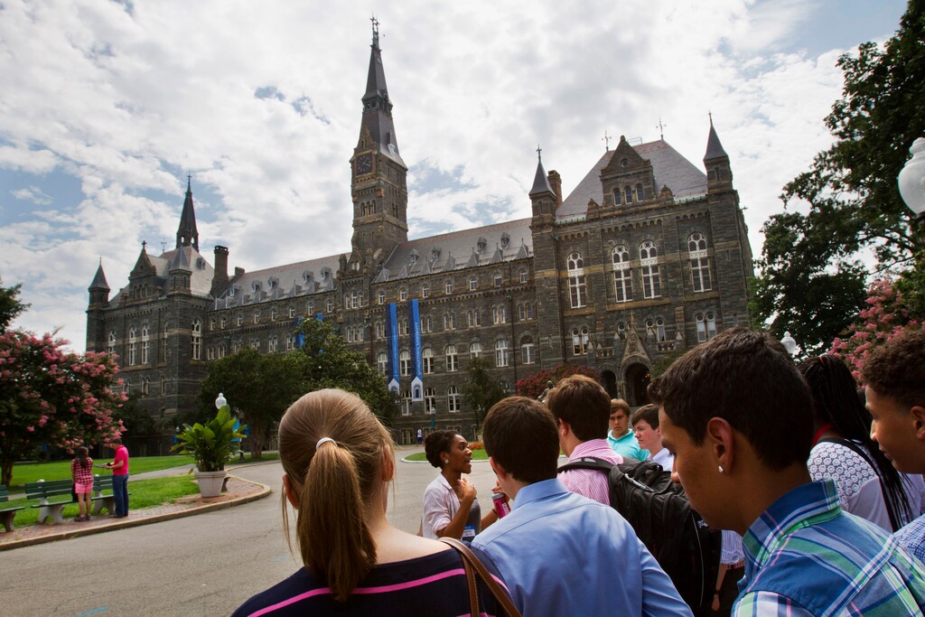(Jacquelyn Martin | AP photo)

In this July 10, 2013, photo, prospective students tour Georgetown University's campus in Washington.