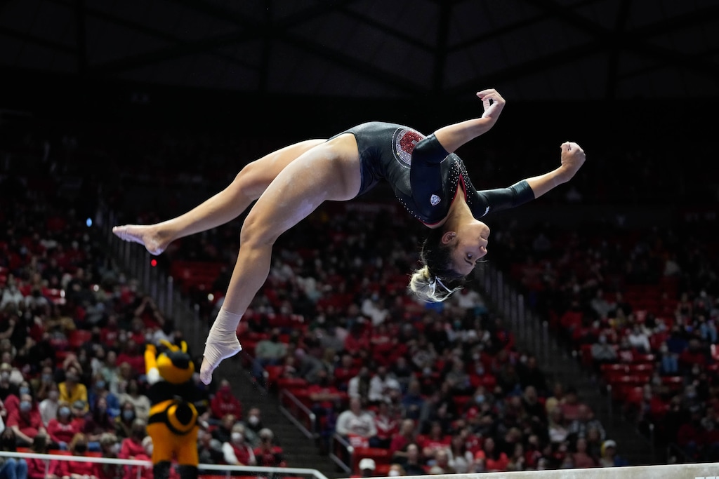 (Francisco Kjolseth | The Salt Lake Tribune) Utah’s Amelie Morgan competes on beam during their gymnastics meet with Stanford at the Huntsman Center in Salt Lake City, Saturday, Jan. 29, 2022.