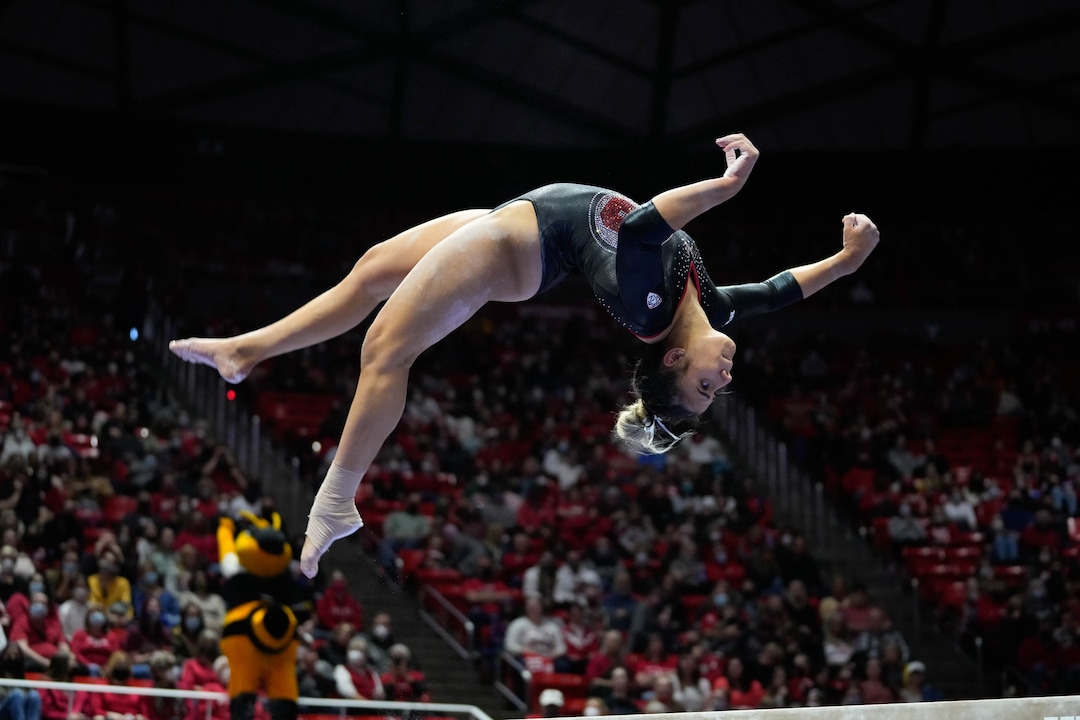 (Francisco Kjolseth | The Salt Lake Tribune) Utah’s Amelie Morgan competes on beam during their gymnastics meet with Stanford at the Huntsman Center in Salt Lake City, Saturday, Jan. 29, 2022.