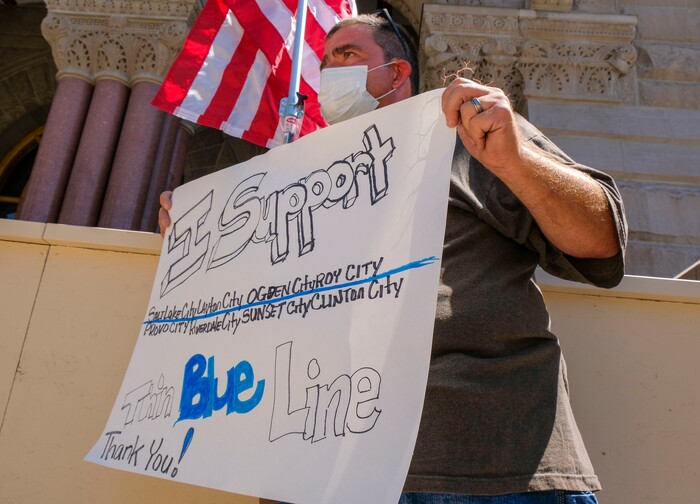 (Leah Hogsten | The Salt Lake Tribune) Steve Stevenson and fellow supporters of law enforcement gather at Back the Blue rally, Saturday, August 15, 2020 at Washington Square.