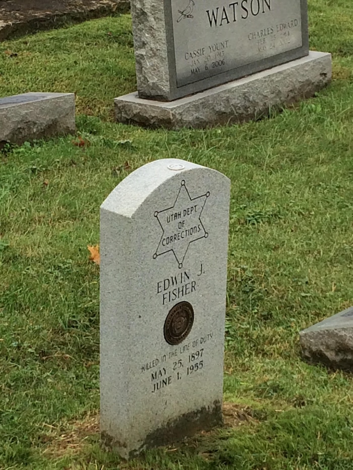 (Courtesy of Utah Department of Corrections)  Officer Edwin J. Fisher, who was killed June 1, 1955, by an inmate at the Utah State Prison, was laid to rest in an unmarked grave. On Wednesday, Oct. 11, 2017, the Utah Department of Corrections and Utah Law Enforcement Memorial board dedicated a headstone at his Frankfort, Ky., burial site.