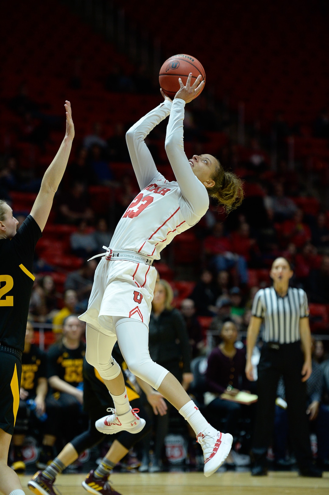 (Francisco Kjolseth  |  The Salt Lake Tribune)  Utah Utes guard/forward Daneesha Provo (23) arches her way into the basket over ASU in Utes' Pac-12 home opener at the Jon M Huntsman Center on Friday, Jan. 4, 2019. They're off to one of their best starts in team history.