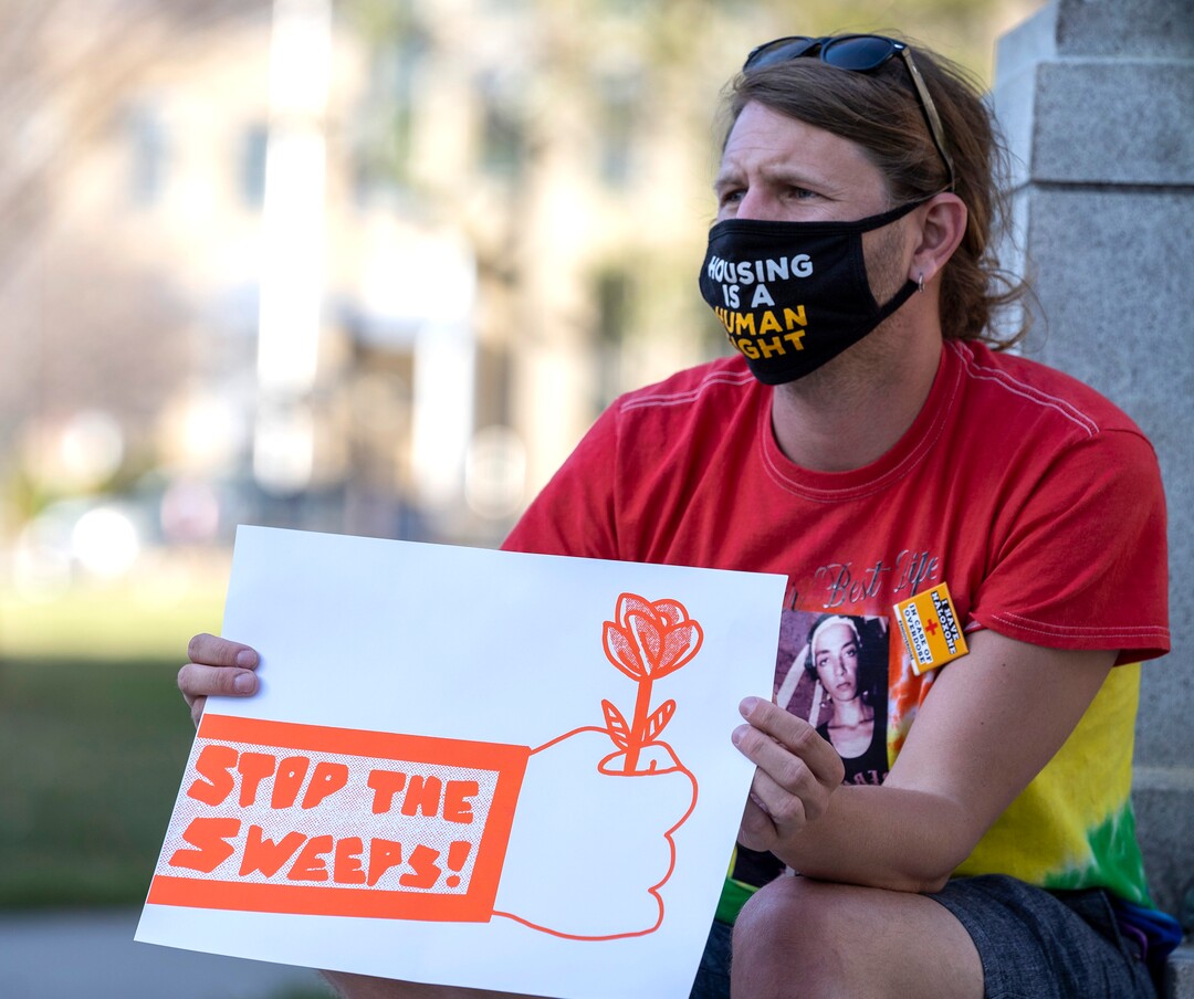 (Rick Egan | The Salt Lake Tribune) Wes Frenell Listens to speakers, during a rally demanding an end to the policy of violence and terror inflicted on our unsheltered community at the hands of the Salt Lake County Health Department, Salt Lake City, and Salt Lake City Police Department, at Washington Square, on Friday, April 2, 2021.