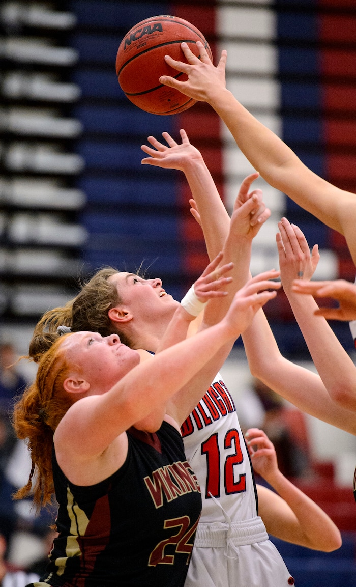 (Trent Nelson  |  The Salt Lake Tribune)  Viewmont's Hannah Simonson and Woods Cross's Paige McKenna reach for the ball as Woods Cross hosts Viewpoint High School girls' basketball, Wednesday, January 24, 2018.