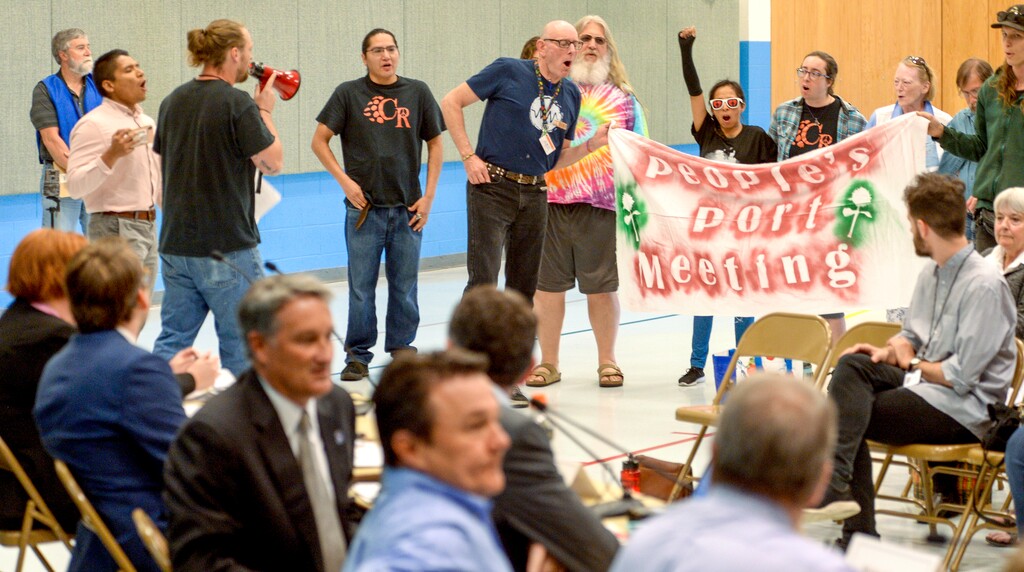 (Leah Hogsten | Tribune file photo)   A group called Civil Riot shut down the Inland Port Authority Board meeting at North Star Elementary's gymnasium Wednesday, April 24, 2019, shortly after it began by speaking over board chairman Derek Miller.