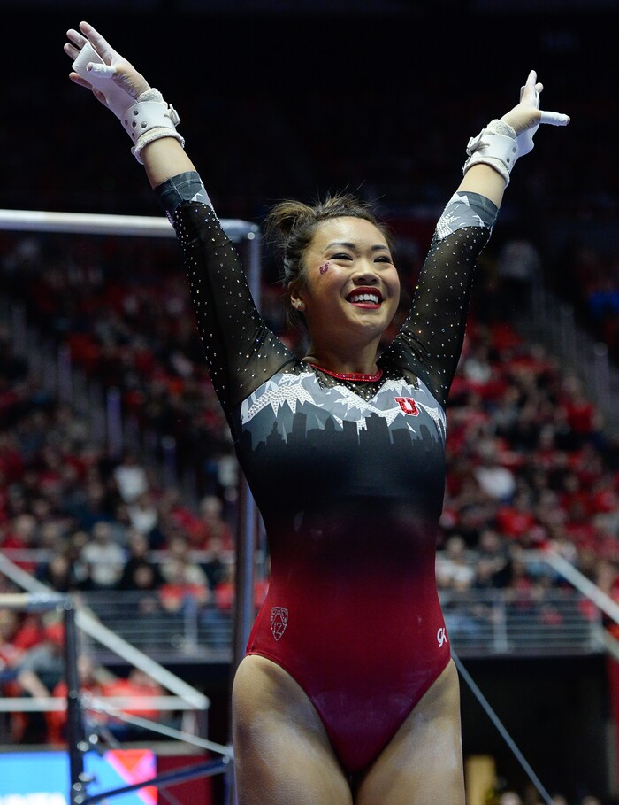 (Francisco Kjolseth  |  The Salt Lake Tribune)  Nailing the landing Kari Lee is cheered by the crowd as Utah hosts Penn State in their season opener at the Huntsman Center in Salt Lake City on Saturday, Jan. 5, 2019.