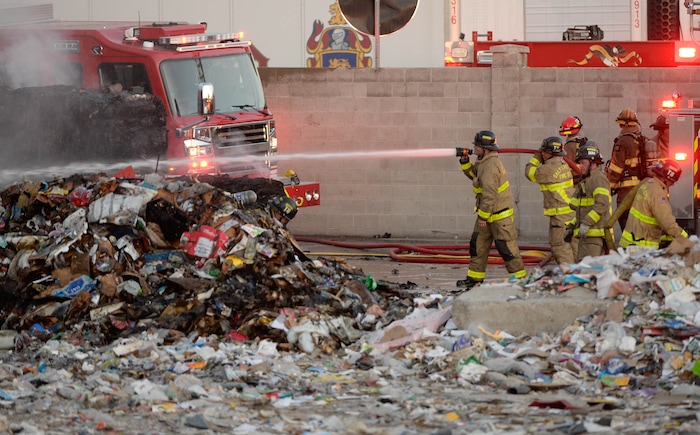(Francisco Kjolseth  |  The Salt Lake Tribune) Fire crews respond to a fire at Rocky Mountain Recycling South Salt Lake on Saturday, July 11, 2020.