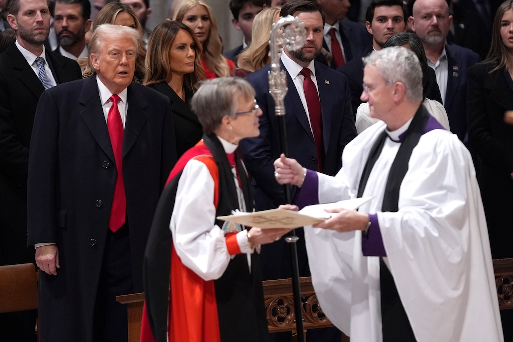 (Evan Vucci | AP) President Donald Trump, from left, watches as the Rt. Rev. Mariann Budde arrives at the national prayer service at the Washington National Cathedral in 2025.
