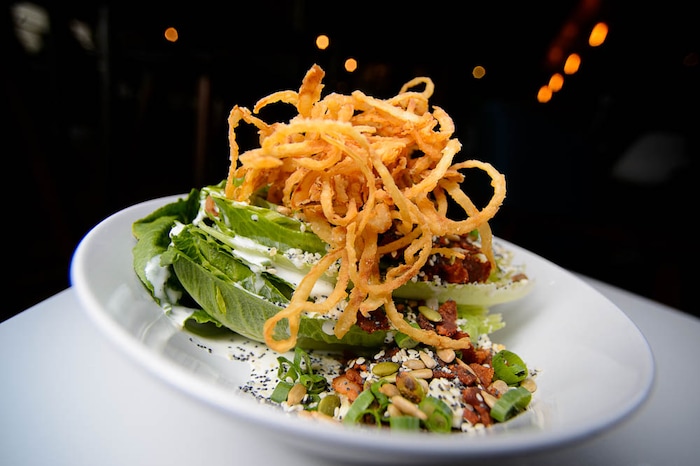 (Trent Nelson | The Salt Lake Tribune)  
Nomad Eatery, a new fast-casual restaurant near the airport in Salt Lake City. The chef/owner is Justin Soelberg, who worked at Avenues Proper and Proper Burger before launching this new eatery. Thursday March 22, 2018. Wedge salad.