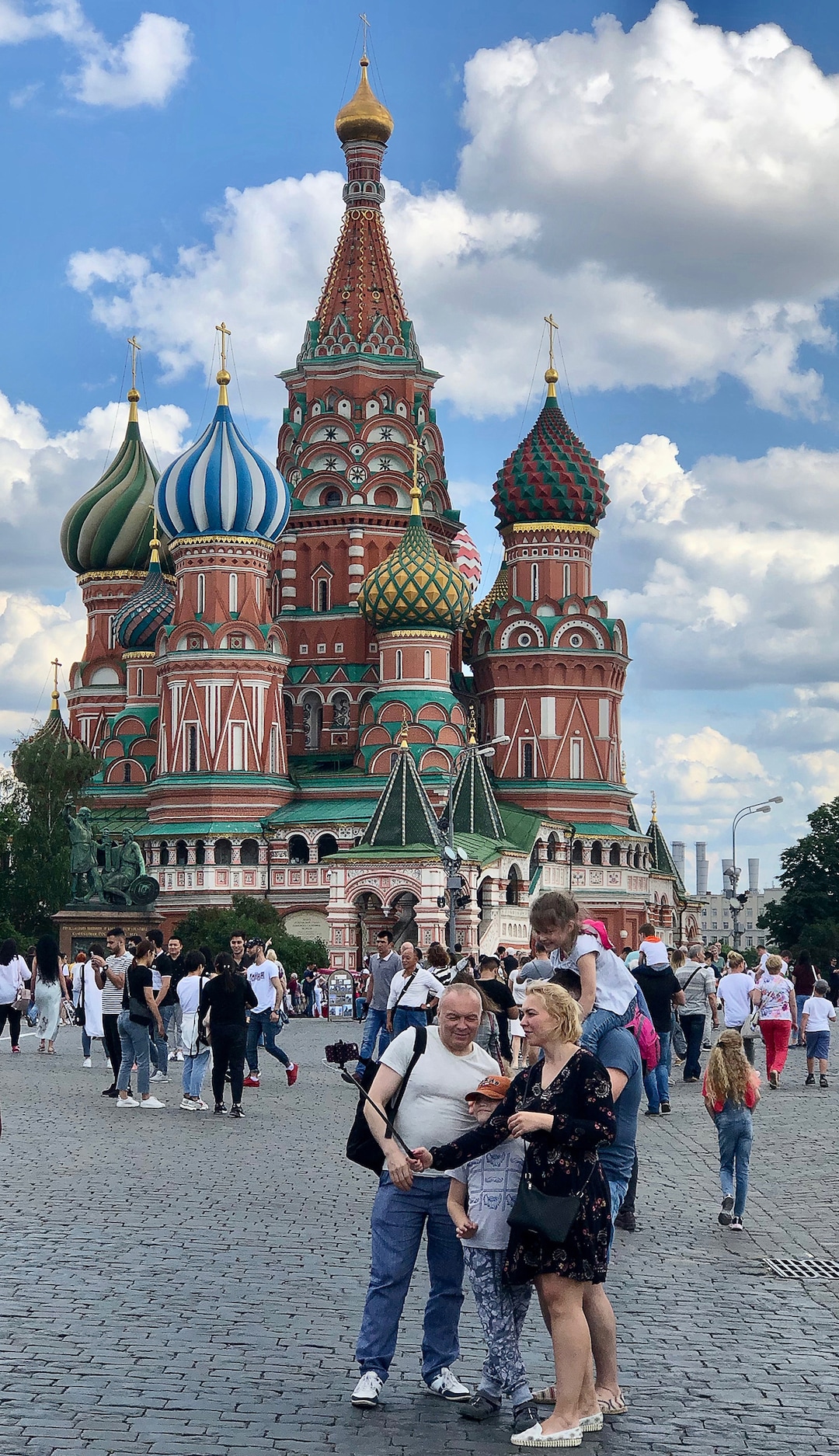 (Michael Stack  | Special to The Salt Lake Tribune) Tourists pose for “selfies” in front of St. Basil’s Cathedral in Moscow.