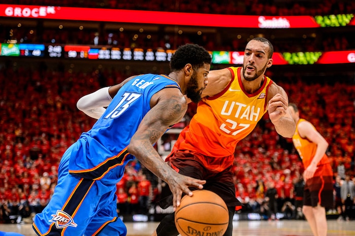 (Trent Nelson | The Salt Lake Tribune)  
Utah Jazz host the Oklahoma City Thunder, Game 3, NBA playoff basketball in Salt Lake City, Saturday April 21, 2018. Utah Jazz center Rudy Gobert (27) defends Oklahoma City Thunder forward Paul George (13).