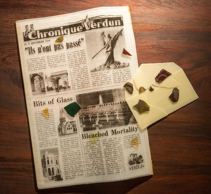 (Rick Egan  |  The Salt Lake Tribune)      Verdun, France, is part of the the McDonald Windows, stained glass exhibit, "Remembered Light," which features fragments from World War II windows. The exhibit brought to Utah by the Salt Lake Interfaith Roundtable & the Peace Committee of the Utah District of Rotary International. The exhibit runs through Nov 17, at 175 South Main, in Salt Lake City. Monday, Oct. 29, 2018.


