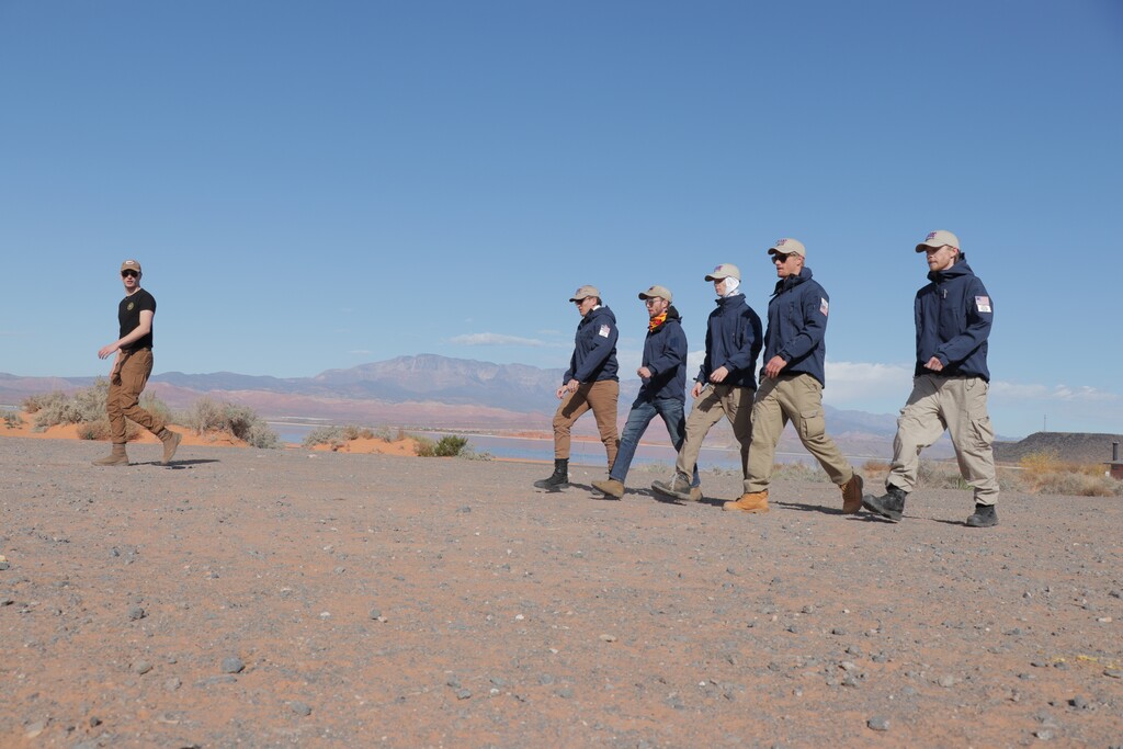 (Unicorn Riot) A photo obtained by the news website Unicorn Riot shows members of the white supremacist group Patriot Front conducting training in Southern Utah in November 2021.