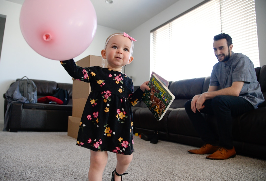 (Francisco Kjolseth  |  The Salt Lake Tribune)  Jeremy spends time with his daughter Jemma, 1, at their home in Lehi after moving there from Pleasant Grove last October with his wife Ember because they could get more house for their money there, and it's closer to Jeremy's job at Adobe in Lehi.