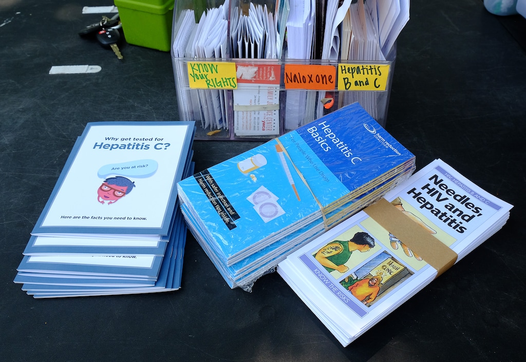 (Francisco Kjolseth  |  The Salt Lake Tribune)  The Utah Harm Reduction Coalition sets up a needle exchange table near 865 W. North Temple on Saturday, Aug. 4, 2018, one of several stops six days a week to help reduce the risks of hepatitis and HIV.