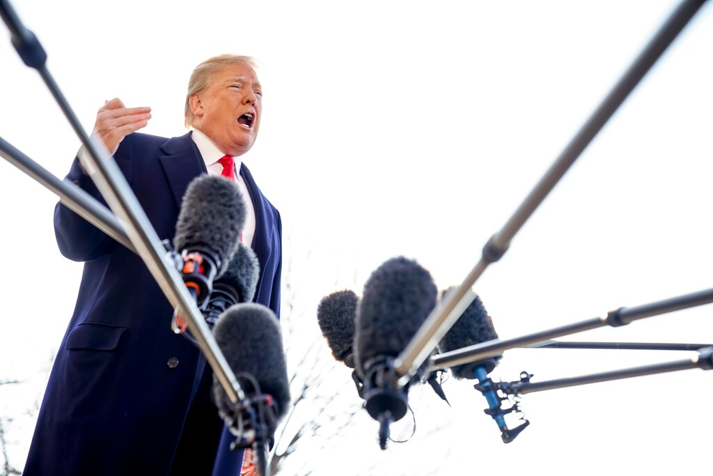 (AP Photo | Andrew Harnik) President Donald Trump speaks to reporters before boarding Marine One on the South Lawn of the White House in Washington, Tuesday, March 13, 2018, to travel to Andrews Air Force Base, Md.