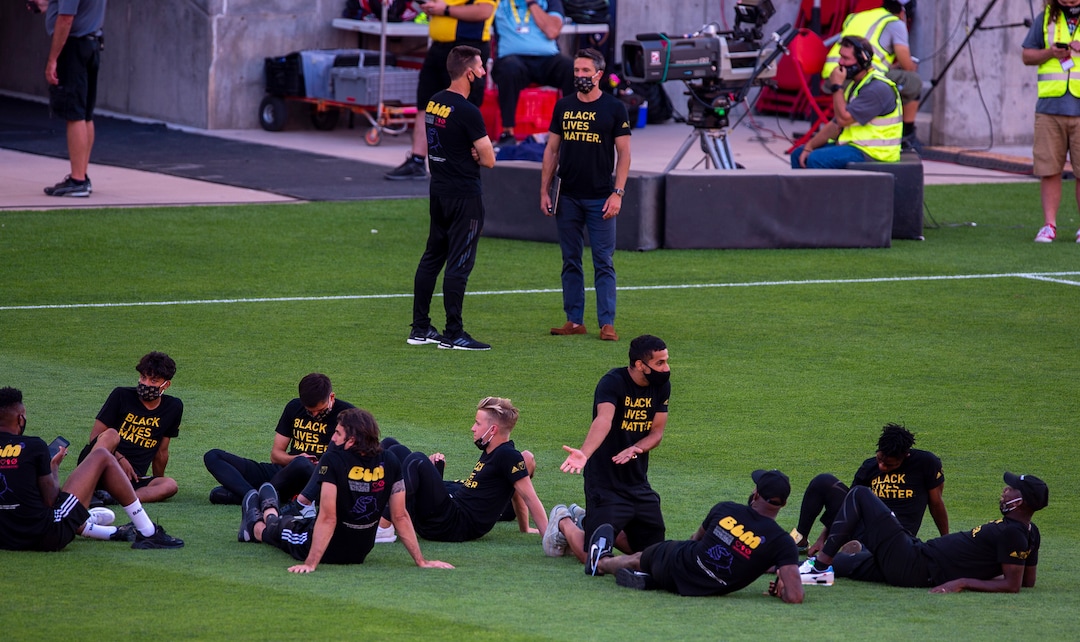 (Rick Egan  |  The Salt Lake Tribune)     Players mingle on the field wearing Black Lives Matter shirts, in the empty stadium as the game between Real Salt Lake and LAFC was postponed after teams in sports leagues across the country boycotted scheduled games to protest the police shooting of Jacob Blake, RSL and LAFC followed suit, along with the rest of MLS, on Wednesday, Aug. 26, 2020.