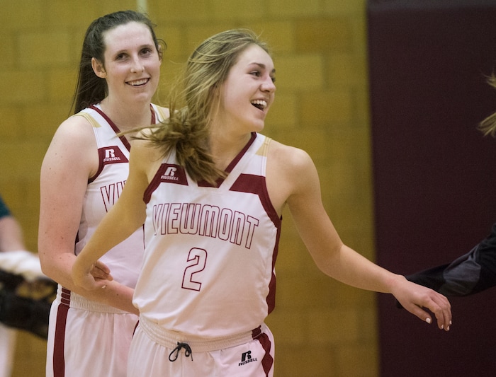 (Rick Egan  |  The Salt Lake Tribune)    Mercedes Staples (12), and Emma Carr (2) celebrate Viewmont High's last second win over Bingham, in prep basketball action, in Bountiful, Wednesday, January 3, 2018.