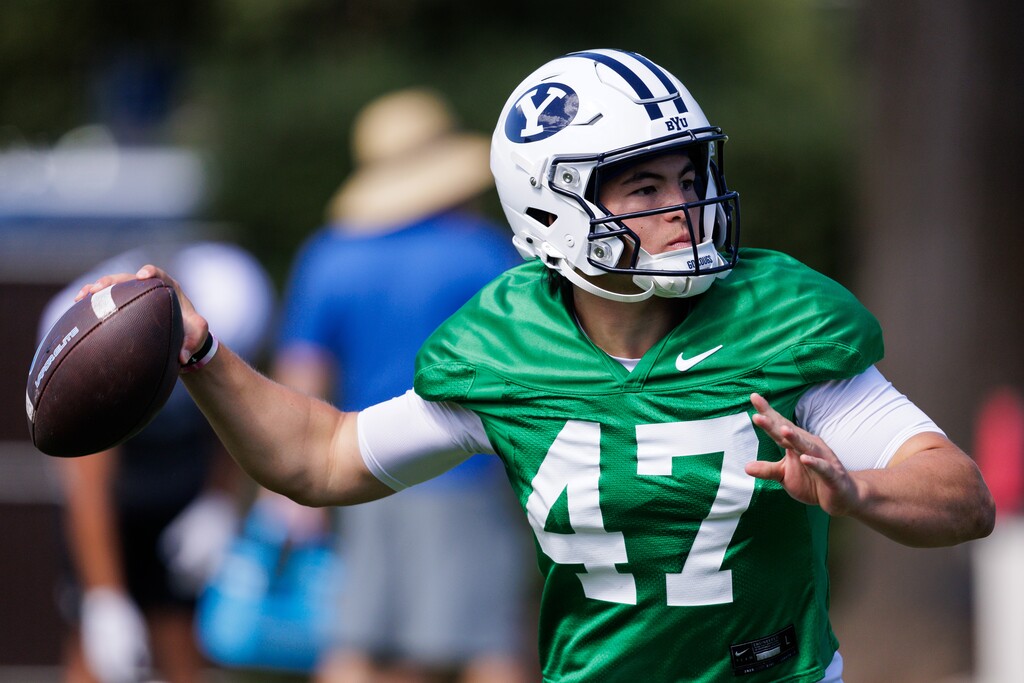 (Jaren Wilkey | BYU) Cougars quarterback Bear Bachmeier throws a pass during fall camp in Provo, Aug. 2, 2025.