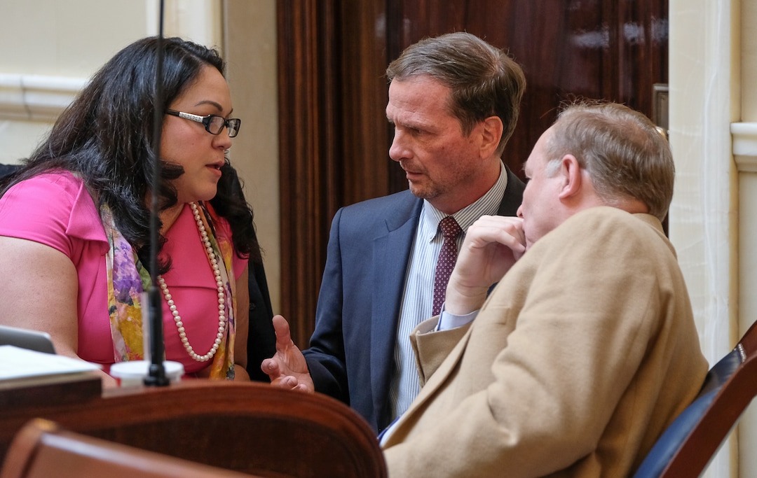 (Francisco Kjolseth  |  The Salt Lake Tribune)  Congressman Chris Stewart, center, speaks with Senator Luz Escamilla, D-Salt Lake, and Jim Dabakis, D-Salt Lake, who both exclaimed "tell us you are going to take care of the Dreamers, right?" as he visited the senate floor on day two of the 2018 legislative session on Tuesday, Jan. 23, 2018. Daca 'Dreamers' is the federal government program created in 2012 under Barack Obama to allow people brought to the US illegally as children the temporary right to live, study and work in America.