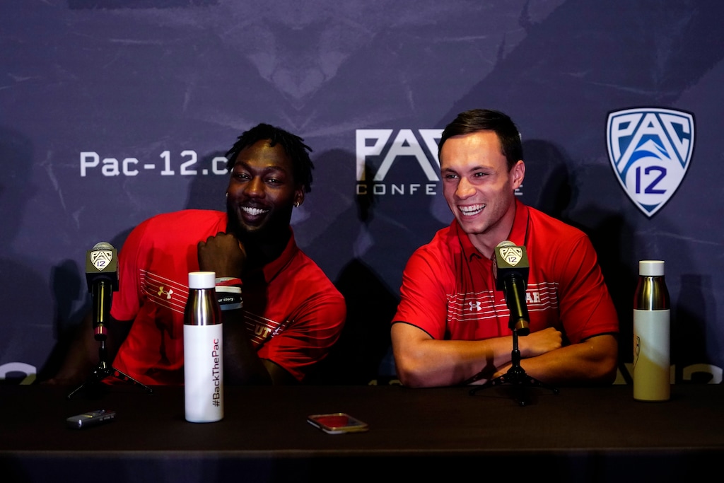 (Marcio Jose Sanchez | AP) Utah wide receiver Britain Covey, right, and linebacker Devin Lloyd answer questions during the Pac-12 Conference NCAA college football Media Day Tuesday, July 27, 2021, in Los Angeles.