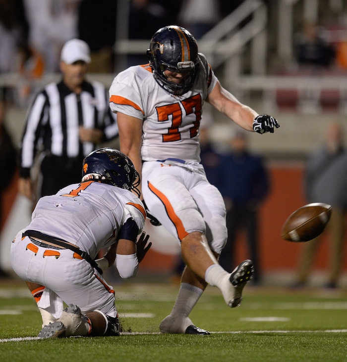 (Francisco Kjolseth  |  The Salt Lake Tribune)  Eli Wells of Mountain Crest kicks a field goal over Stansbury in their class 4A semifinal game at Rice-Eccles Stadium, Thursday, Nov. 9, 2017.