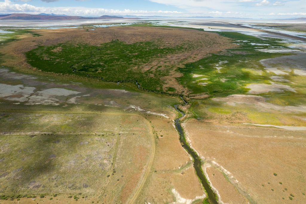 (Trent Nelson | The Salt Lake Tribune) Water treated by the North Davis Sewer District makes its way into Farmington Bay of the Great Salt Lake on Tuesday, May 31, 2022. Lawmakers passed a bill meant to bar reuse of treated wastewater that currently flows to the lake, but may have spurred a flurry of applications for reuse projects instead.