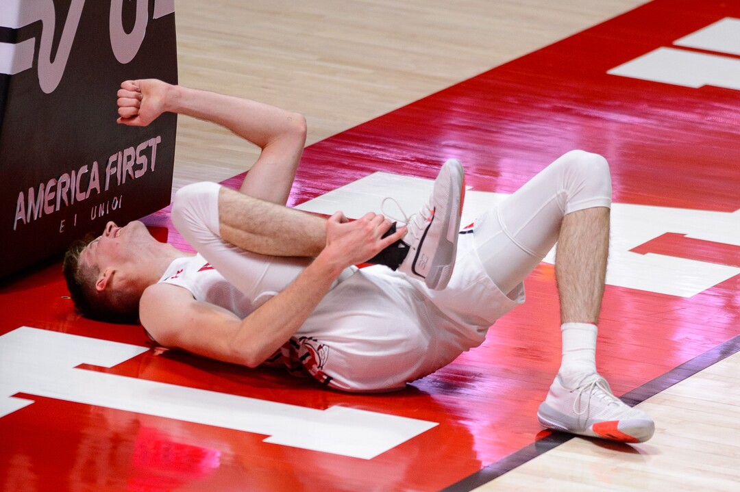 (Trent Nelson  |  The Salt Lake Tribune) Utah Utes center Branden Carlson (35) in pain as Utah hosts Colorado, NCAA basketball in Salt Lake City on Monday, Jan. 11, 2021.