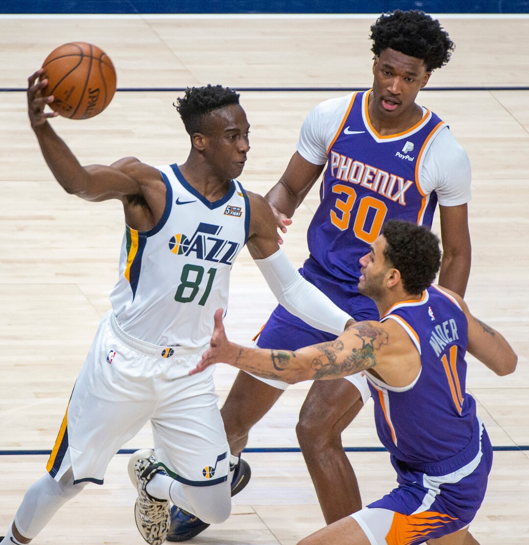 (Rick Egan | The Salt Lake Tribune)  Utah Jazz guard Miye Oni (81) is guarded by Phoenix Suns center Damian Jones (30) in preseason NBA action between Utah Jazz and Phoenix Suns at Vivint SmartHome Area, on Saturday, Dec. 12, 2020.