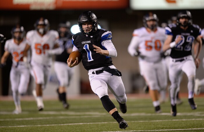(Francisco Kjolseth  |  The Salt Lake Tribune)  Stansbury's quarterback Mitch Lindsay runs the ball down field against Mountain Crest in their class 4A semifinal game at Rice-Eccles Stadium, Thursday, Nov. 9, 2017.