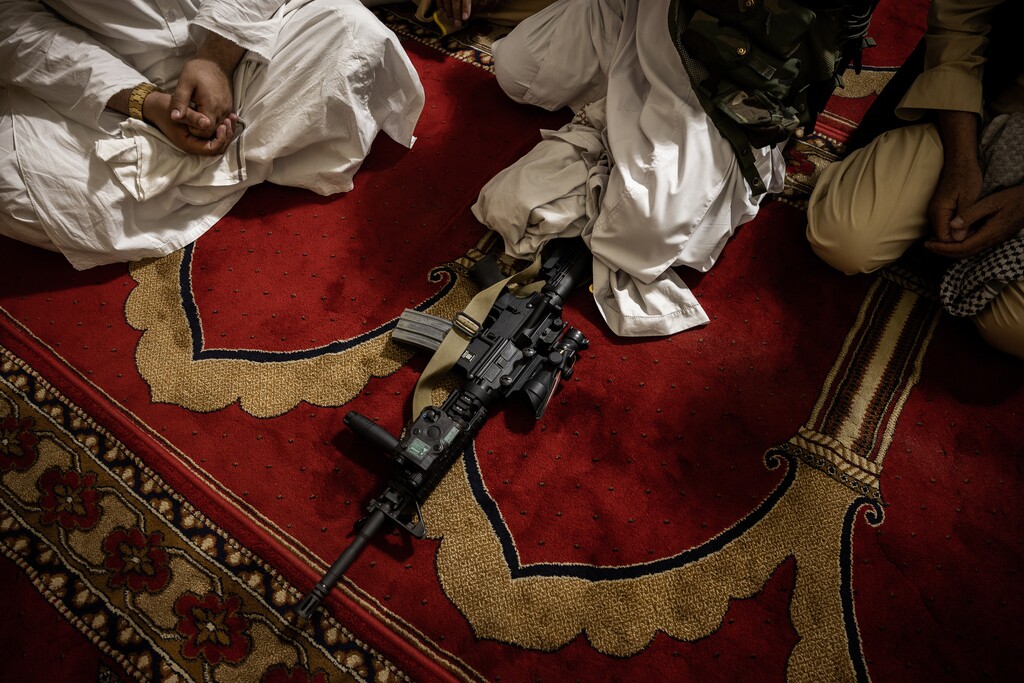 (Jim Huylebroek | The New York Times)
A gun is seen at Friday prayer at the Pul-i-Khishti Mosque in Kabul, Afghanistan, Aug. 20, 2021. “Criminologists can debate the causes of the new crime wave,” writes New York Times columnist Bret Stephens. “But many people intuitively understand that places in which decay and disorder become the norm are places where crime tends to thrive.”