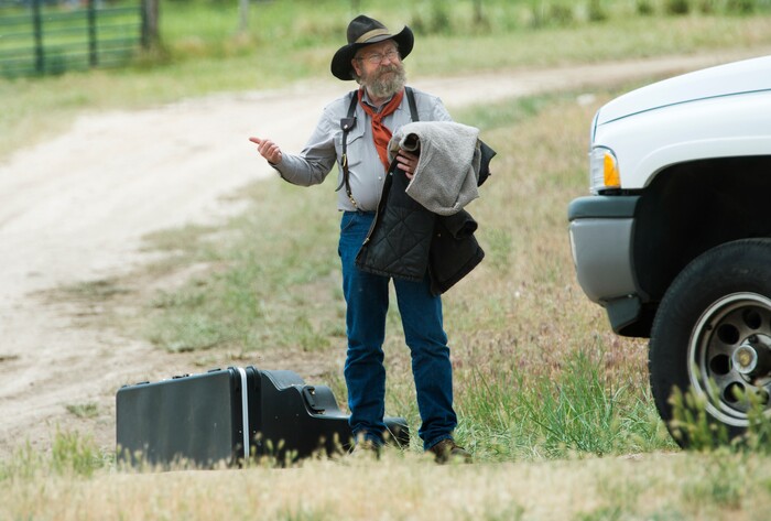 (Rick Egan  |  The Salt Lake Tribune) Tony  Messerly waits for a lift after performing at the 13th Annual Cowboy Legends, Music & Poetry Festival at the Historic Fielding Garr Ranch on Antelope Island, Sunday, May 27, 2018. The Festival continues through Monday.