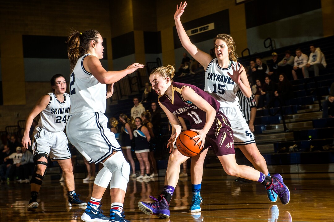 Chris Detrick  |  The Salt Lake TribuneMaple Mountain's Liz Eaton (11) runs past Salem Hills' Lauren Gustin (12) and Salem Hills' Olivia Sampson (15) during the game at Salem Hills High School Tuesday January 12, 2016. Salem Hills won the game 82-63.