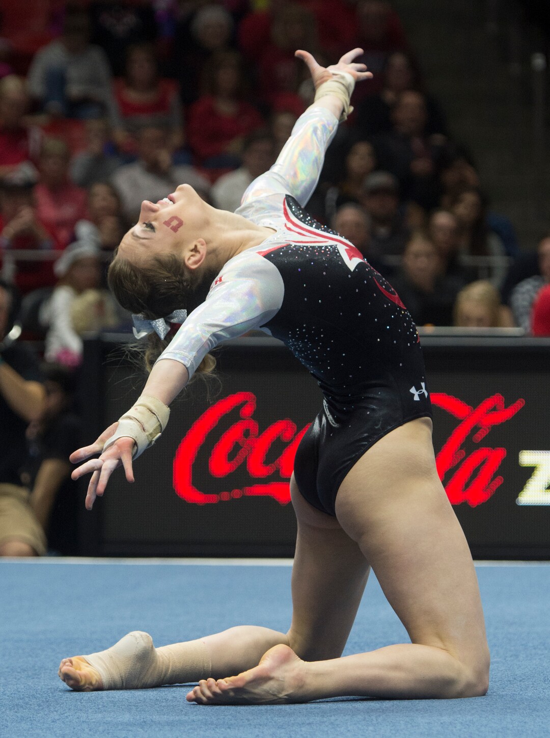 Rick Egan  |  The Salt Lake TribuneTiffani Lewis performs on the floor, in Gymnastics action, Utah vs. Washington, Saturday, February 13, 2016.