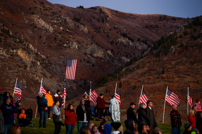 Leah Hogsten  |  The Salt Lake Tribune   Veterans, family members of active and retired military and patriotic supporters celebrated Veteran's Day at the Barker Park amphitheater in North Ogden with a  memorial for North Ogden's hometown hero Army Major Brent Russell Taylor, who was killed in action on November 3, 2018, while training an Afghan Army commando battalion in Afghanistan. 
