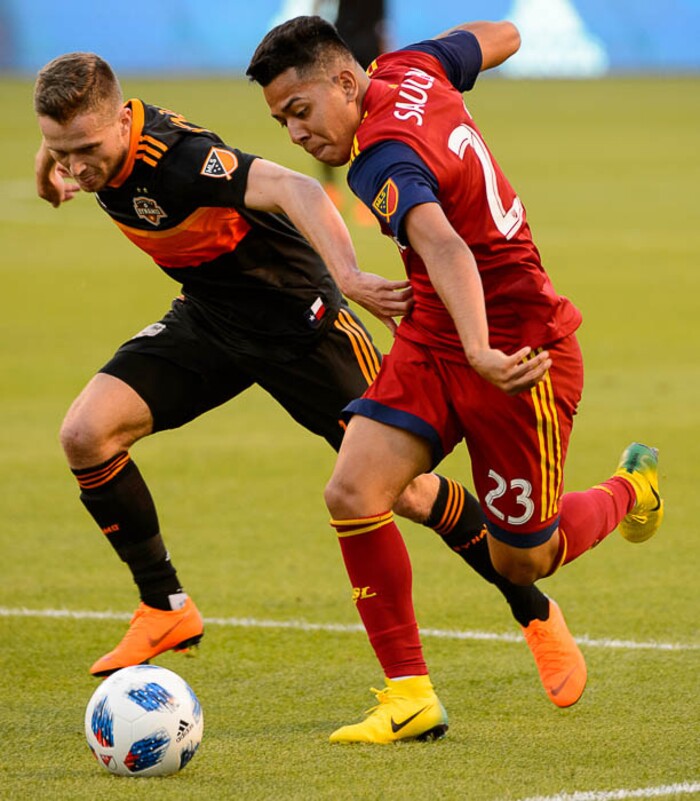 (Trent Nelson | The Salt Lake Tribune)  
Houston Dynamo midfielder Charlie Ward (14) and Real Salt Lake midfielder Sebastian Saucedo (23) as Real Salt Lake hosts Houston Dynamo, MLS Soccer at Rio Tinto Stadium in Sandy, Utah, Wednesday May 30, 2018.