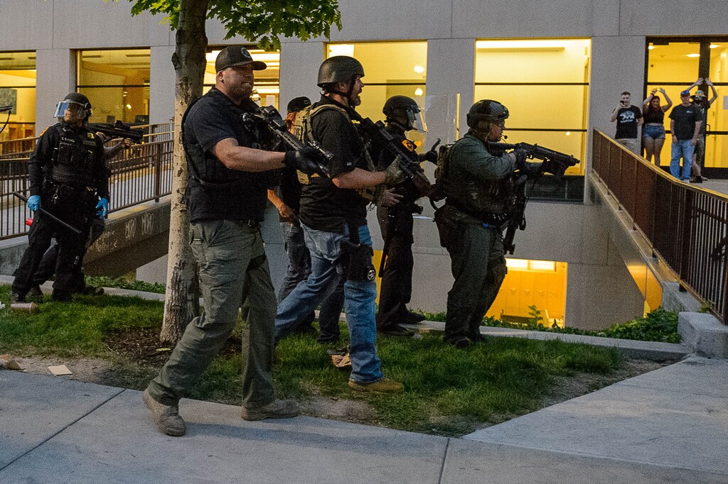 (Trent Nelson  |  Tribune file photo)  Police move in to make an arrest after a protest against police brutality turned violent in Salt Lake City on Saturday, May 30, 2020.