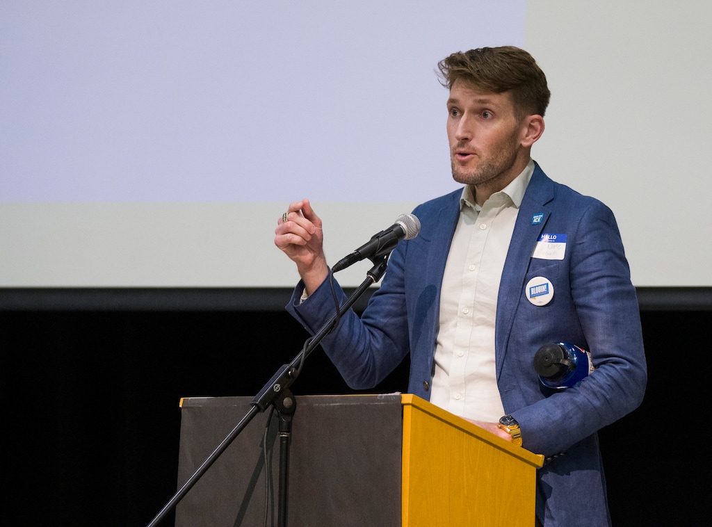 (Bethany Baker  |  The Salt Lake Tribune) Sen. Nate Blouin, D-Millcreek, speaks during caucus night for the Utah Democratic Party at Beacon Heights Elementary in Salt Lake City on Tuesday, March 17, 2026.
