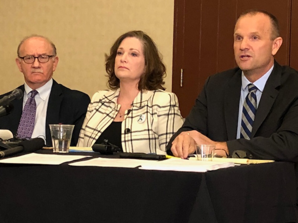 (Salt Lake Tribune file photo) McKenna Denson, center, speaks at an April 5, 2018, news conference after filing a lawsuit against The Church of Jesus Christ of Latter-day Saints, flanked by lawyers Jeffrey Oritt, left, and Craig Vernon. On Friday, May 31, Vernon and Oritt pulled out of the case, and a magistrage gave Denson three weeks to find new lawyers.