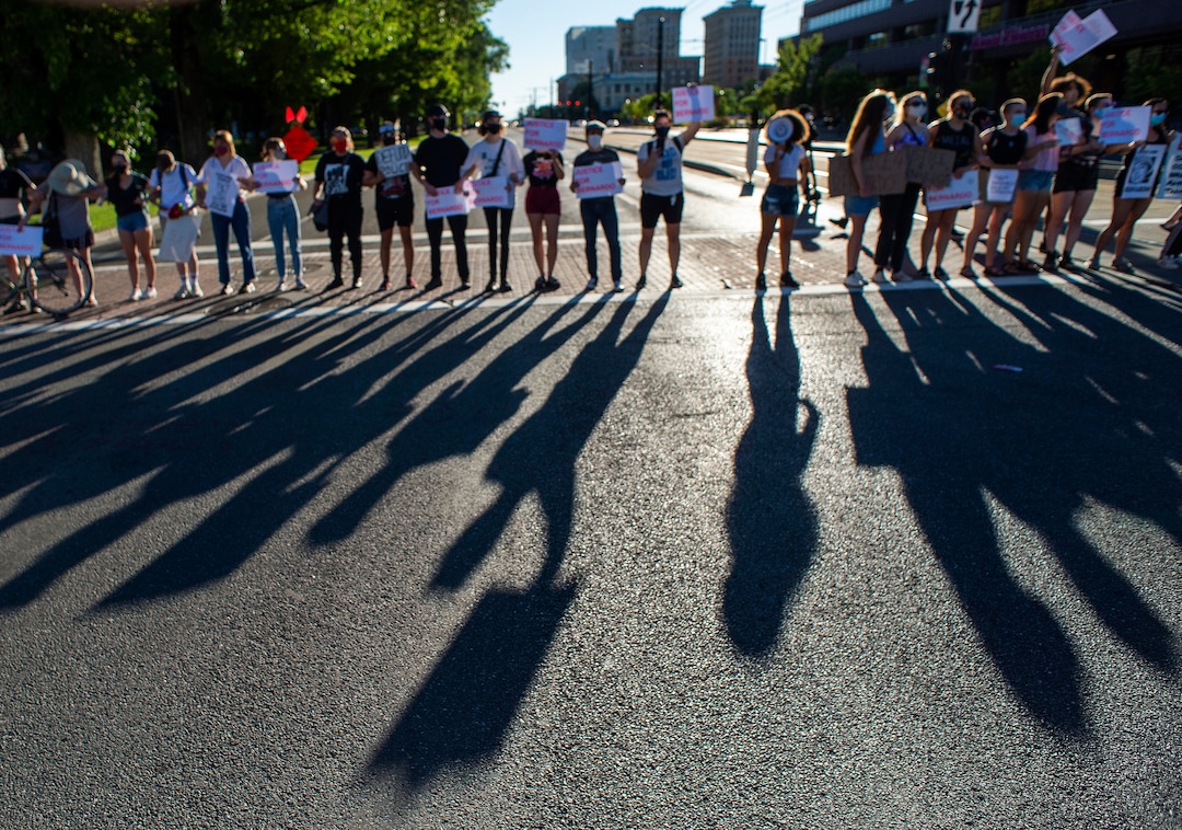 (Rick Egan  |  The Salt Lake Tribune) Protesters stand together on 400 South in Salt Lake City during a Justice for Bernardo Palacios-Carbajal protest on Tuesday, June 23, 2020.