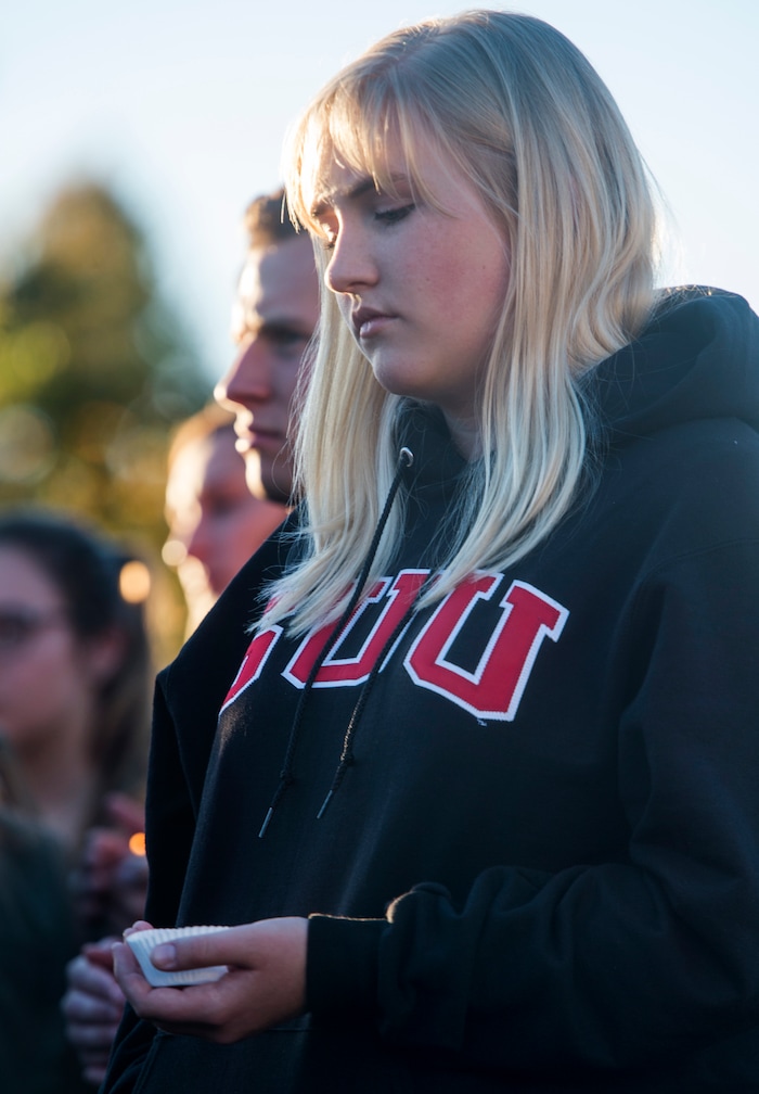 (Rick Egan  |  The Salt Lake Tribune)  Utah University student Hanna Lee holds a candle during a candle light vigil for the victims of the Las Vegas shooting, on the SUU campus in Cedar City, Wednesday, October 4, 2017.