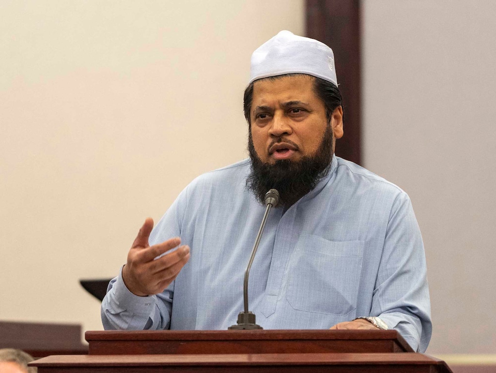 (Rick Egan | The Salt Lake Tribune)  Imam Shuaib Din, speaking in 2023, was targeted by a gunman.