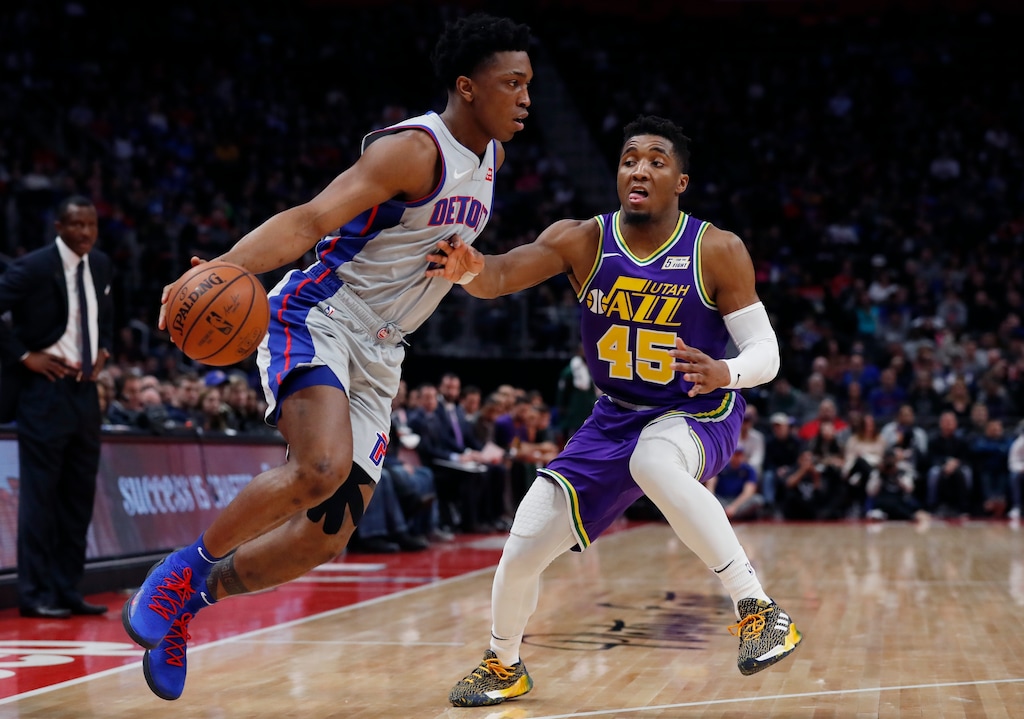 Detroit Pistons forward Stanley Johnson drives on Utah Jazz guard Donovan Mitchell (45) during the second half of an NBA basketball game, Saturday, Jan. 5, 2019, in Detroit. (AP Photo/Carlos Osorio)