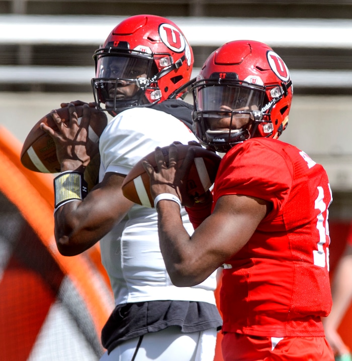 (Steve Griffin  |  The Salt Lake Tribune) Utah quarterbacks Tyler Huntley and Jason Shelley warm-up during the University of Utah football team's first scrimmage at Rice-Eccles Stadium in Salt Lake City Friday March 30, 2018.