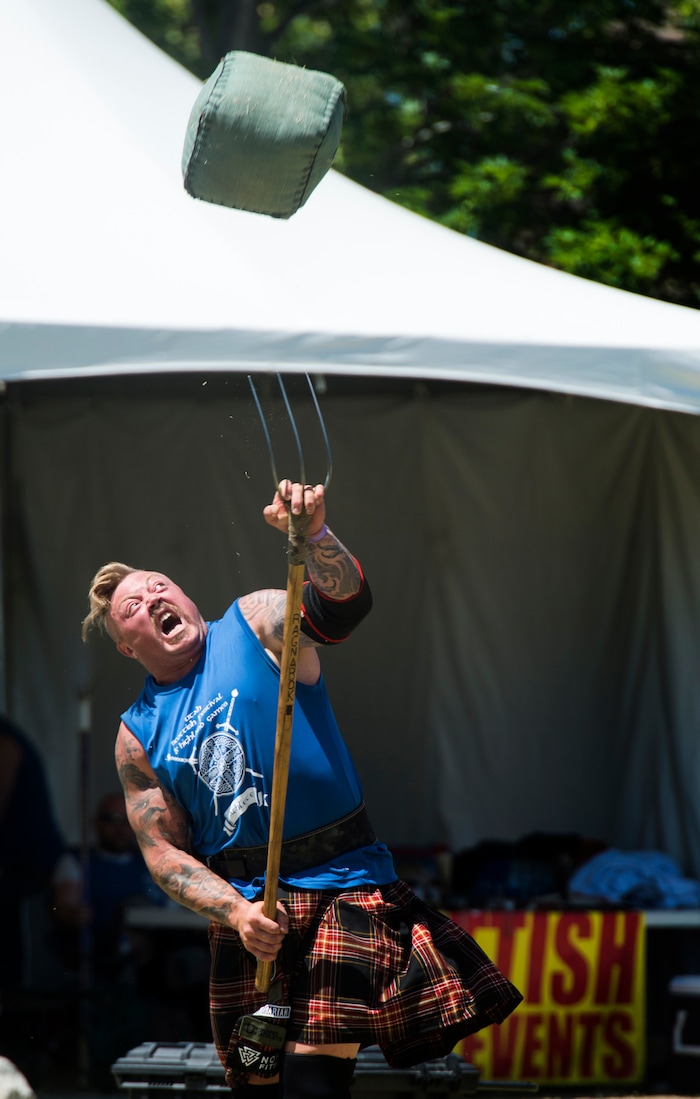 (Rick Egan  |  The Salt Lake Tribune)      John Anthony wins the sheaf toss, by tossing a 20 lb bag over a 30 foot bar, during the 44th annual Utah Scottish Festival and Highland Games at the Utah State Fairgrounds, Sunday, June 10, 2018.