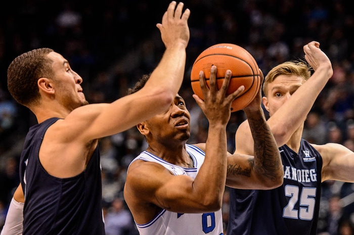 (Trent Nelson | The Salt Lake Tribune)   San Diego Toreros guard Tyler Williams (1), Brigham Young Cougars guard Jahshire Hardnett (0), San Diego Toreros forward Yauhen Massalski (25) as BYU hosts San Diego, NCAA basketball in Provo Saturday January 20, 2018.