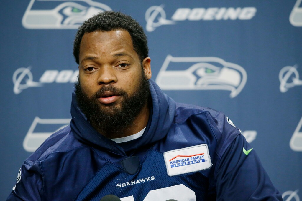 FILE -- In this Jan. 10, 2017 file photo, Seattle Seahawks defensive end Michael Bennett talks to reporters, in Renton, Wash. In a letter posted on Twitter Saturday, Feb. 11, 2017, the American professional football player pulled out of a planned trip to Israel, accusing its government of trying to use him for PR purposes. Bennett cited Muhammad Ali's support for the Palestinians, saying he too wanted to be a "voice for the voiceless." (AP Photo/Ted S. Warren, File)