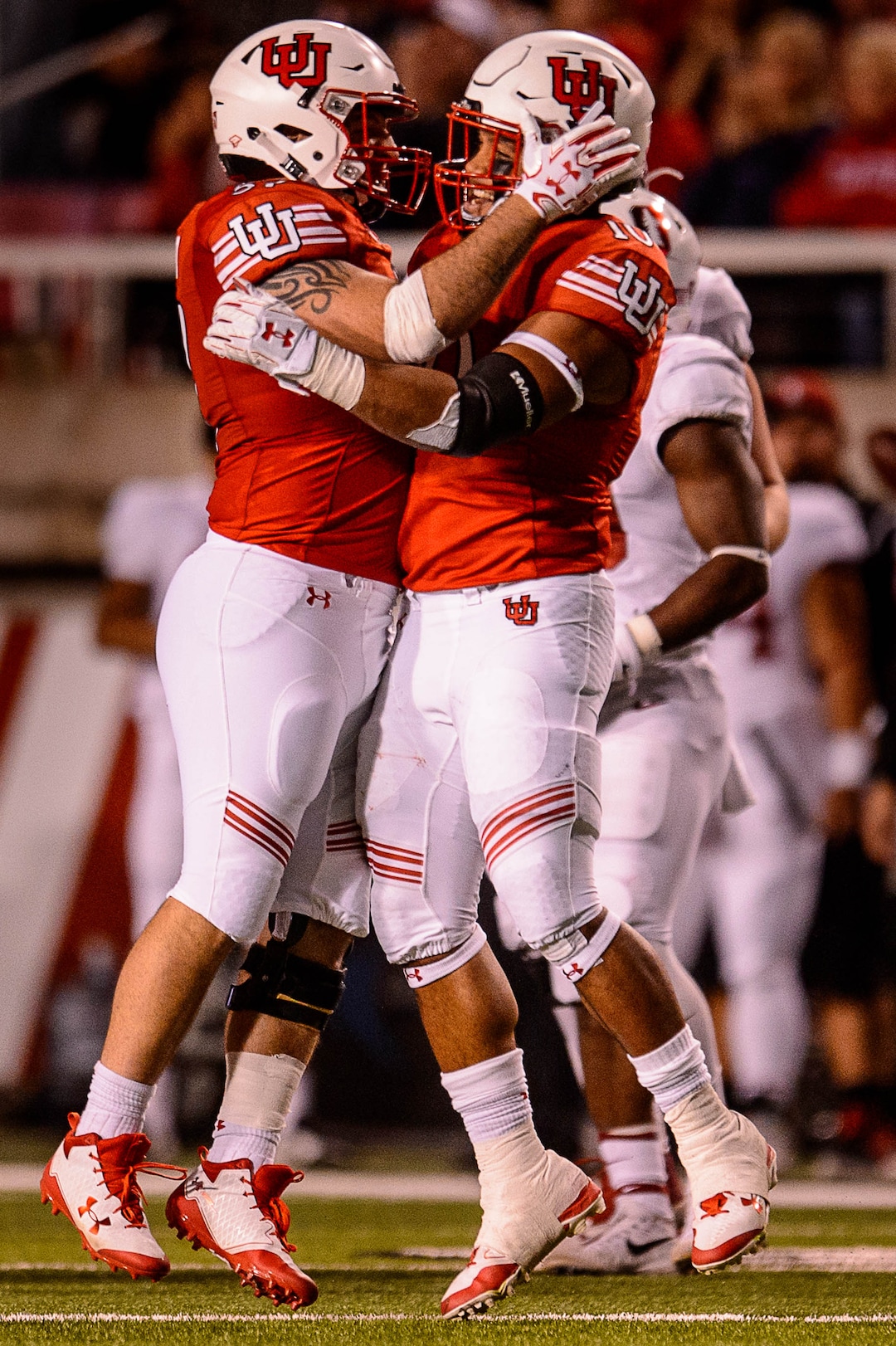 (Trent Nelson | The Salt Lake Tribune)  Utah Utes linebacker Cody Ippolito (57) and Utah Utes linebacker Sunia Tauteoli (10) celebrate a tackle as the University of Utah hosts Stanford, NCAA football at Rice-Eccles Stadium in Salt Lake City Saturday October 7, 2017.