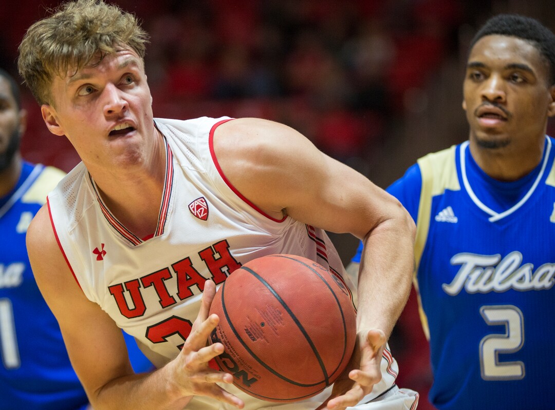 (Rick Egan  |  The Salt Lake Tribune)        Utah Utes center Jayce Johnson (34) looks for a shot, as Tulsa Golden Hurricane guard DaQuan Jeffries (2) looks on, in basketball action between, Utah Utes and Tulsa Golden Hurricane, at the Jon M. Huntsman Center, Saturday, Dec. 1, 2018.