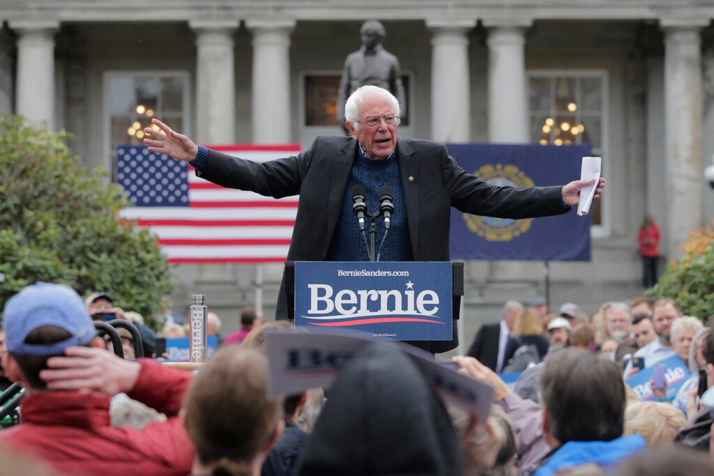(Charles Krupa | AP file photo) Democratic presidential candidate Sen. Bernie Sanders, gestures during a rally after filing to be listed on the New Hampshire primary ballot at the Statehouse in Concord, N.H. on Oct. 31, 2019.